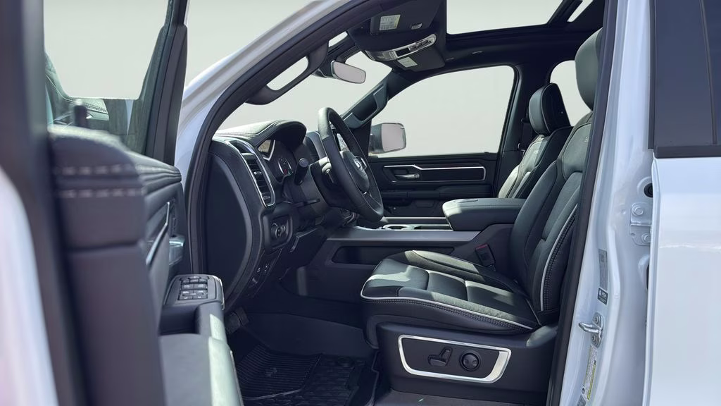 2026 Ivory White Tri-Coat Pearlcoat Ram 1500 Laramie 4X4 Truck