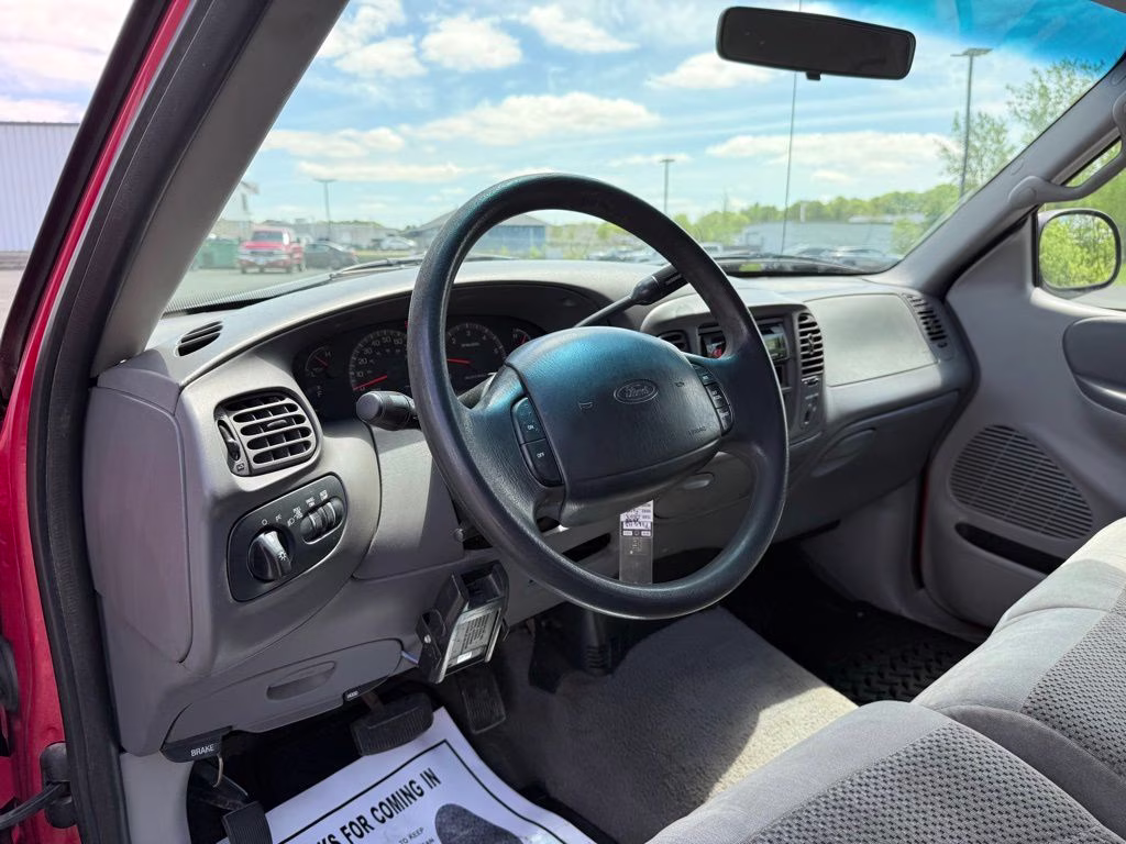1999 Bright Red Clearcoat Ford F-150 XL 4X4 Truck