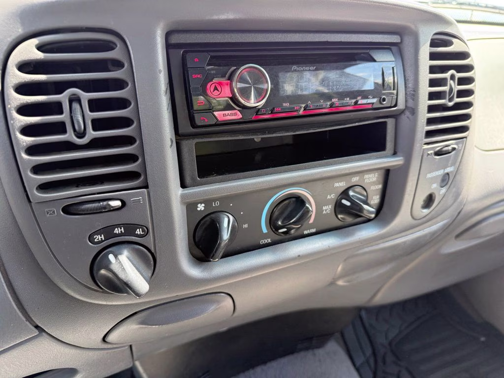 1999 Bright Red Clearcoat Ford F-150 XL 4X4 Truck
