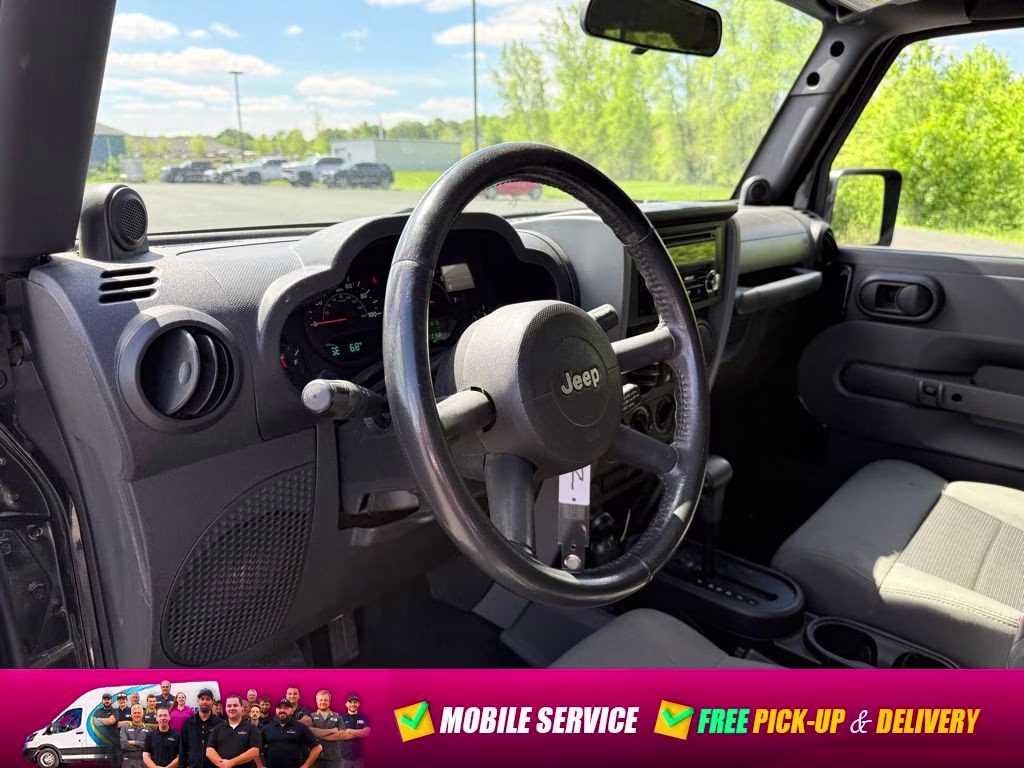 2009 Black Clearcoat Jeep Wrangler Unlimited X 4X4 SUV
