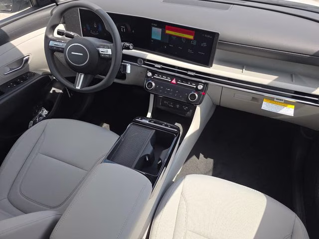 2026 Creamy White Pearl Hyundai Tucson Hybrid SEL AWD SUV