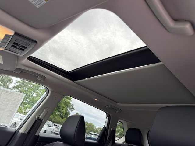 2026 Everest White Pearl Tricoat Nissan Rogue Dark Armor FWD SUV
