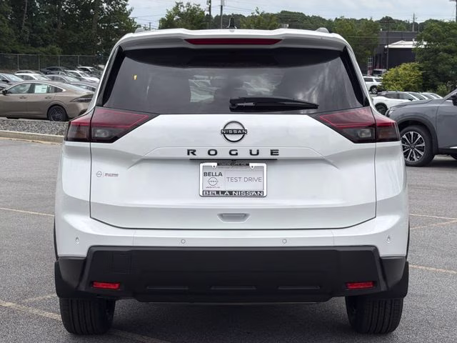 2026 Everest White Pearl Tricoat Nissan Rogue Dark Armor FWD SUV