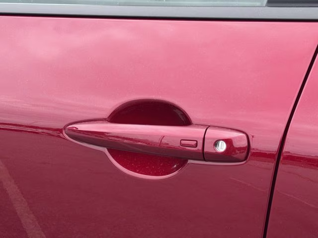 2026 Scarlet Ember Tintcoat Nissan Rogue SV AWD SUV