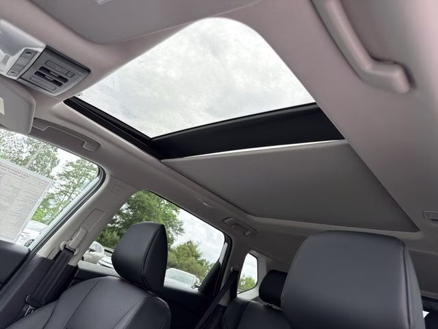 2026 Everest White Pearl Tricoat Nissan Rogue Dark Armor AWD SUV