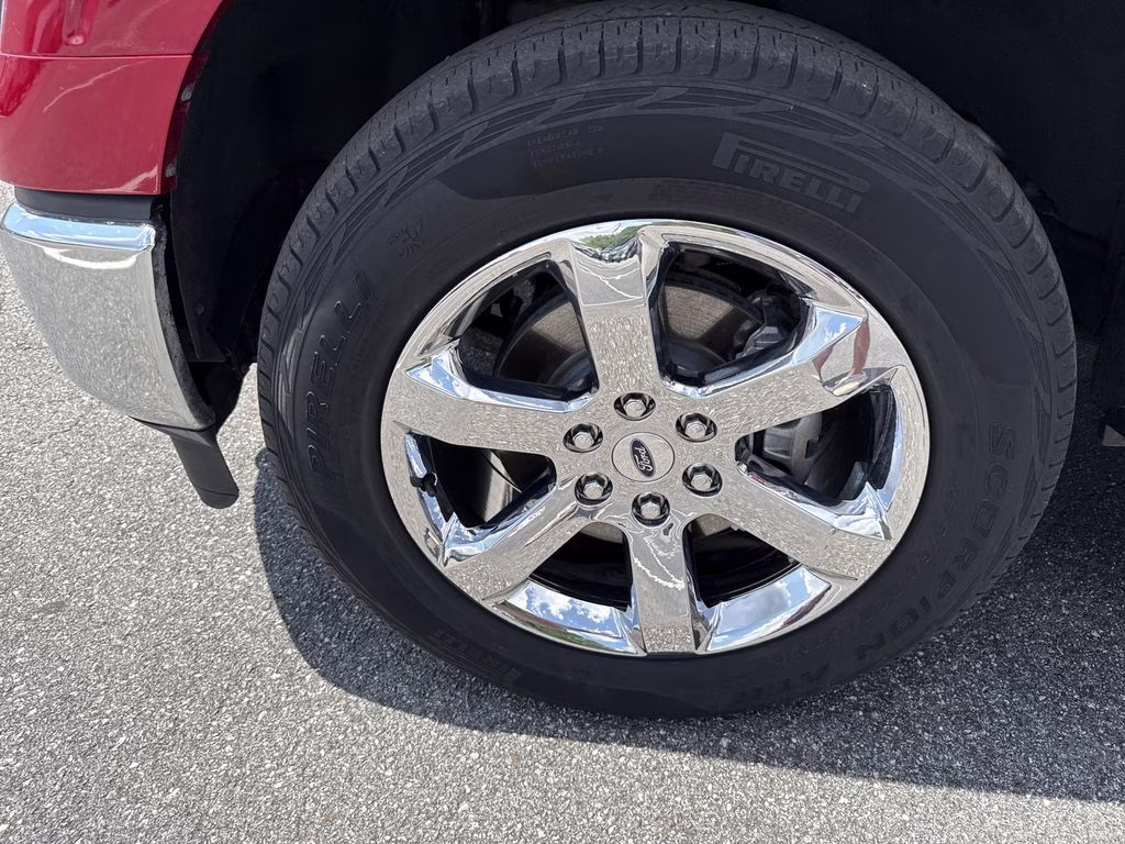 2023 Rapid Red Metallic Tinted Clearcoat Ford F-150 Lariat 4X4 Truck