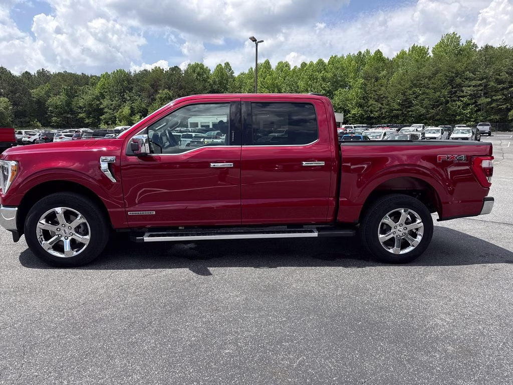 2023 Rapid Red Metallic Tinted Clearcoat Ford F-150 Lariat 4X4 Truck