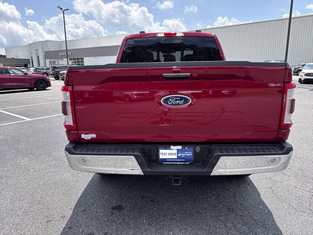 2023 Rapid Red Metallic Tinted Clearcoat Ford F-150 Lariat 4X4 Truck