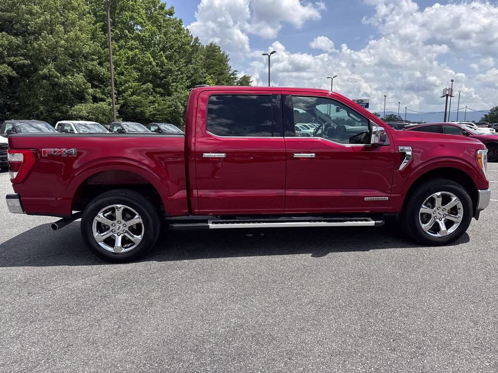 2023 Rapid Red Metallic Tinted Clearcoat Ford F-150 Lariat 4X4 Truck