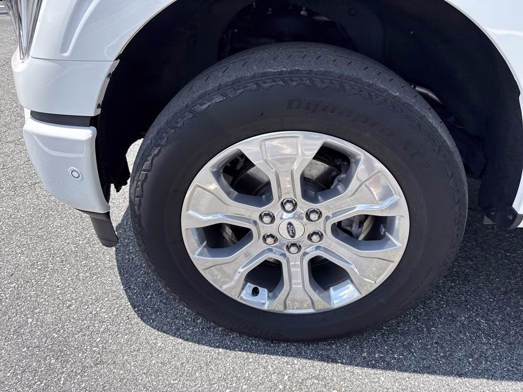 2023 Star White Metallic Tri-Coat Ford F-150 Platinum 4X4 Truck