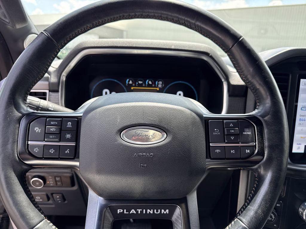 2023 Star White Metallic Tri-Coat Ford F-150 Platinum 4X4 Truck