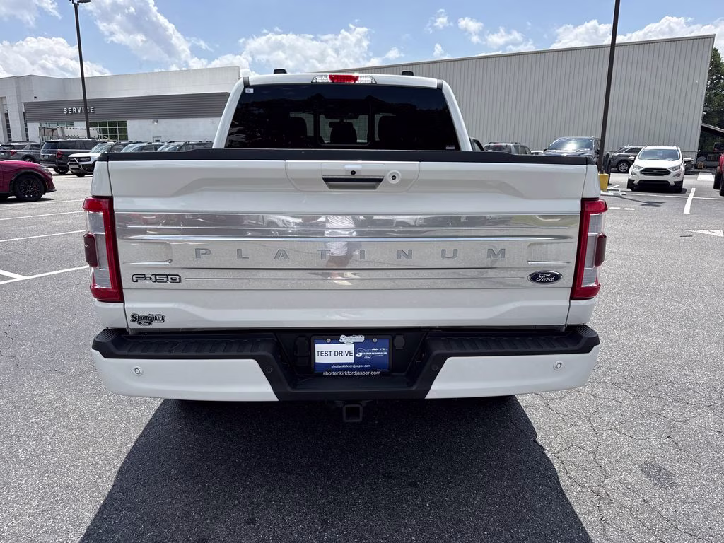 2023 Star White Metallic Tri-Coat Ford F-150 Platinum 4X4 Truck