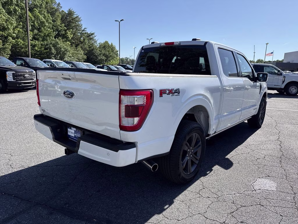2023 Star White Metallic Tri-Coat Ford F-150 Lariat 4X4 Truck