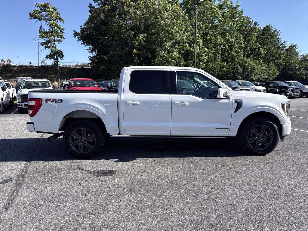 2023 Star White Metallic Tri-Coat Ford F-150 Lariat 4X4 Truck