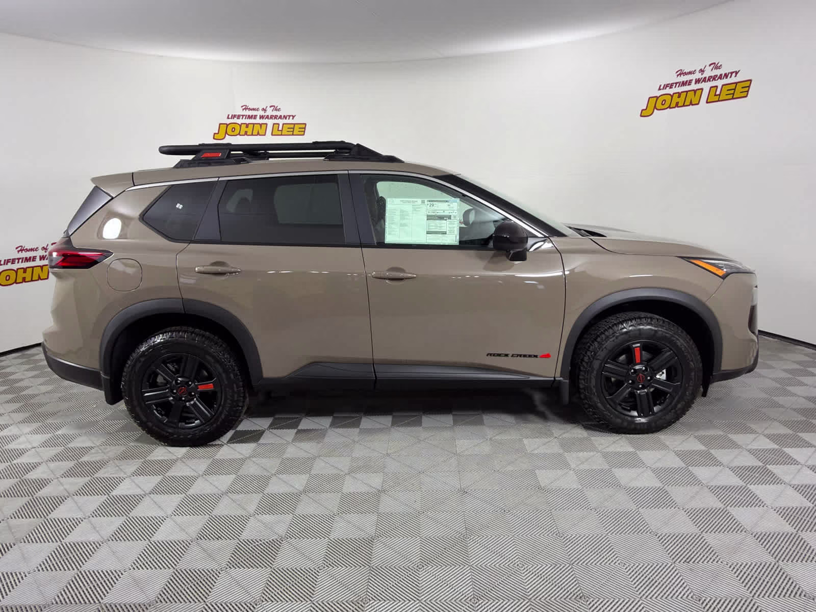 2026 Baja Storm Metallic Nissan Rogue Rock Creek AWD SUV