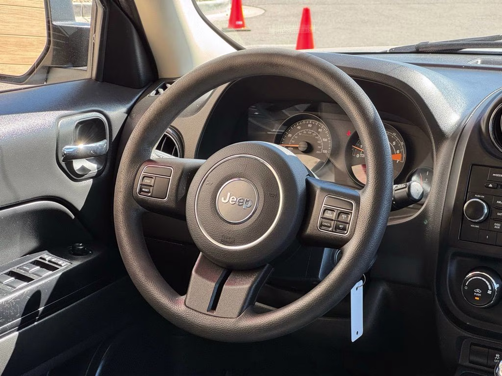 2014 Bright Silver Metallic Clearcoat Jeep Patriot Sport 4X4 SUV