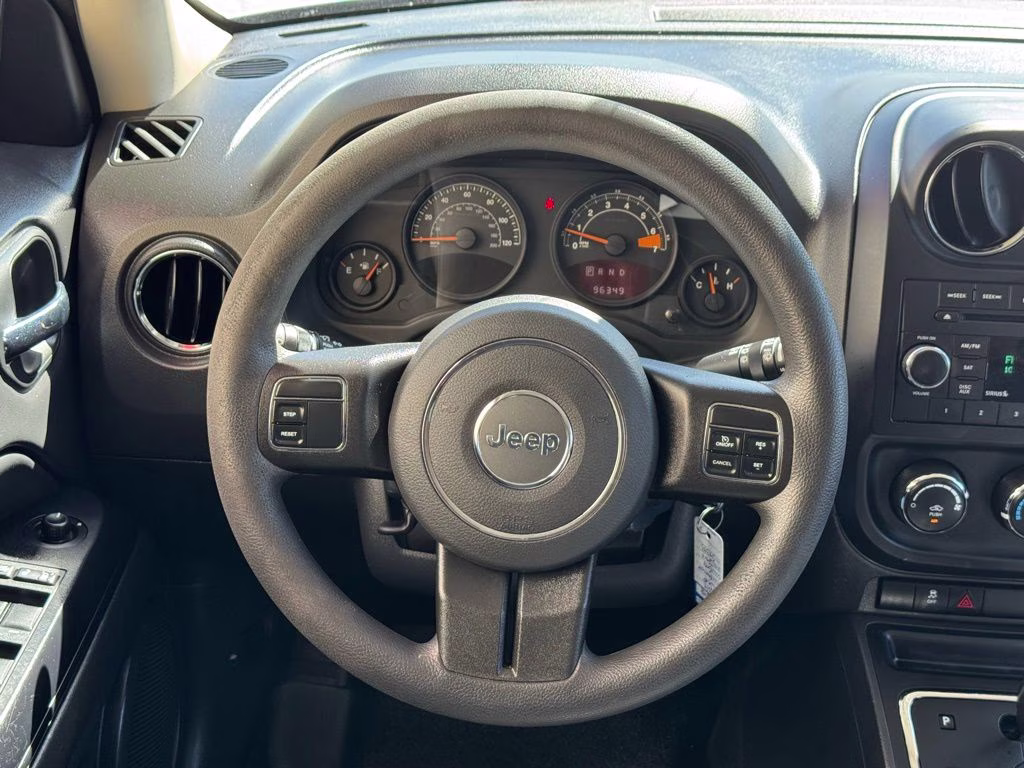 2014 Bright Silver Metallic Clearcoat Jeep Patriot Sport 4X4 SUV