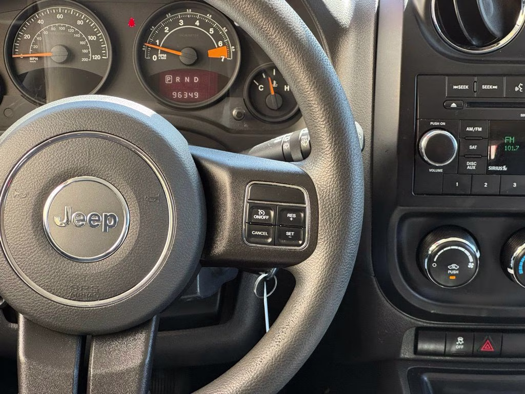 2014 Bright Silver Metallic Clearcoat Jeep Patriot Sport 4X4 SUV