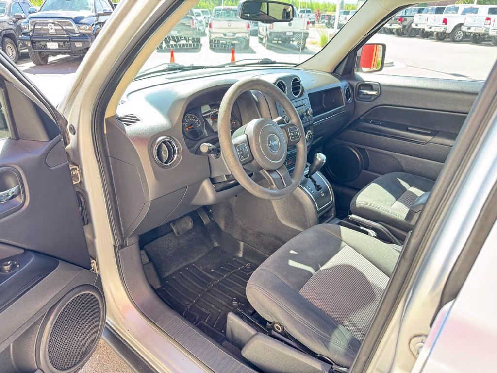 2014 Bright Silver Metallic Clearcoat Jeep Patriot Sport 4X4 SUV
