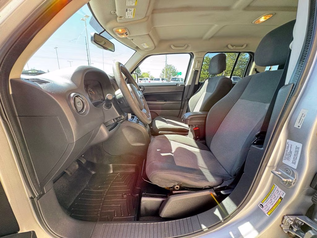 2014 Bright Silver Metallic Clearcoat Jeep Patriot Sport 4X4 SUV