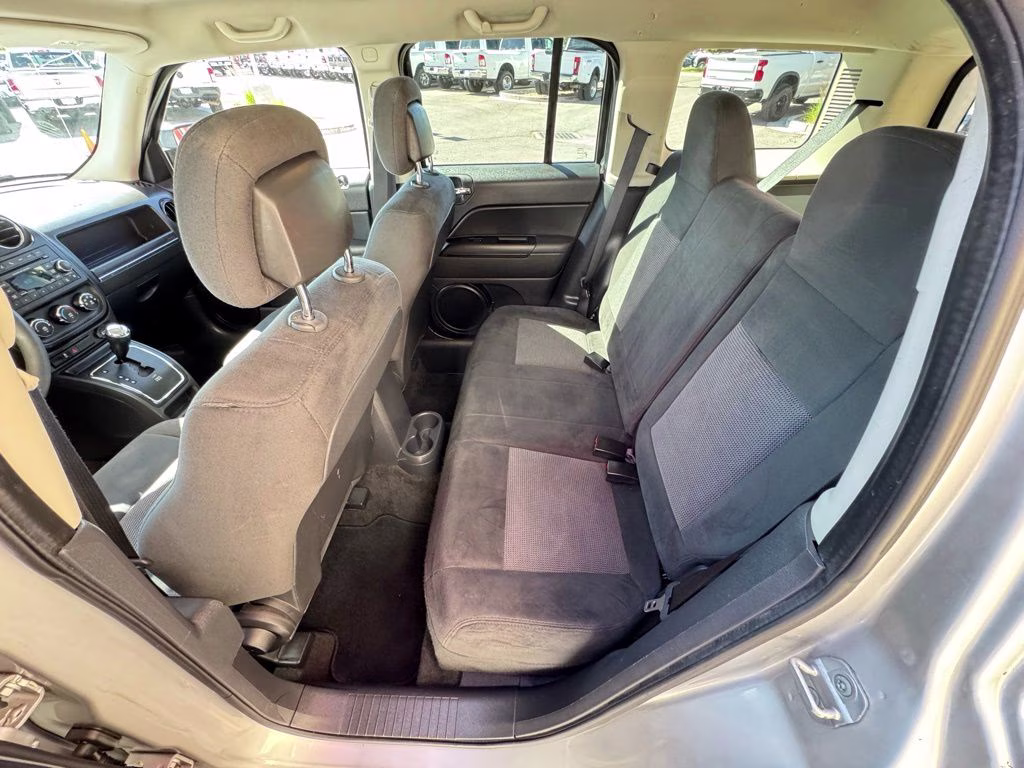 2014 Bright Silver Metallic Clearcoat Jeep Patriot Sport 4X4 SUV