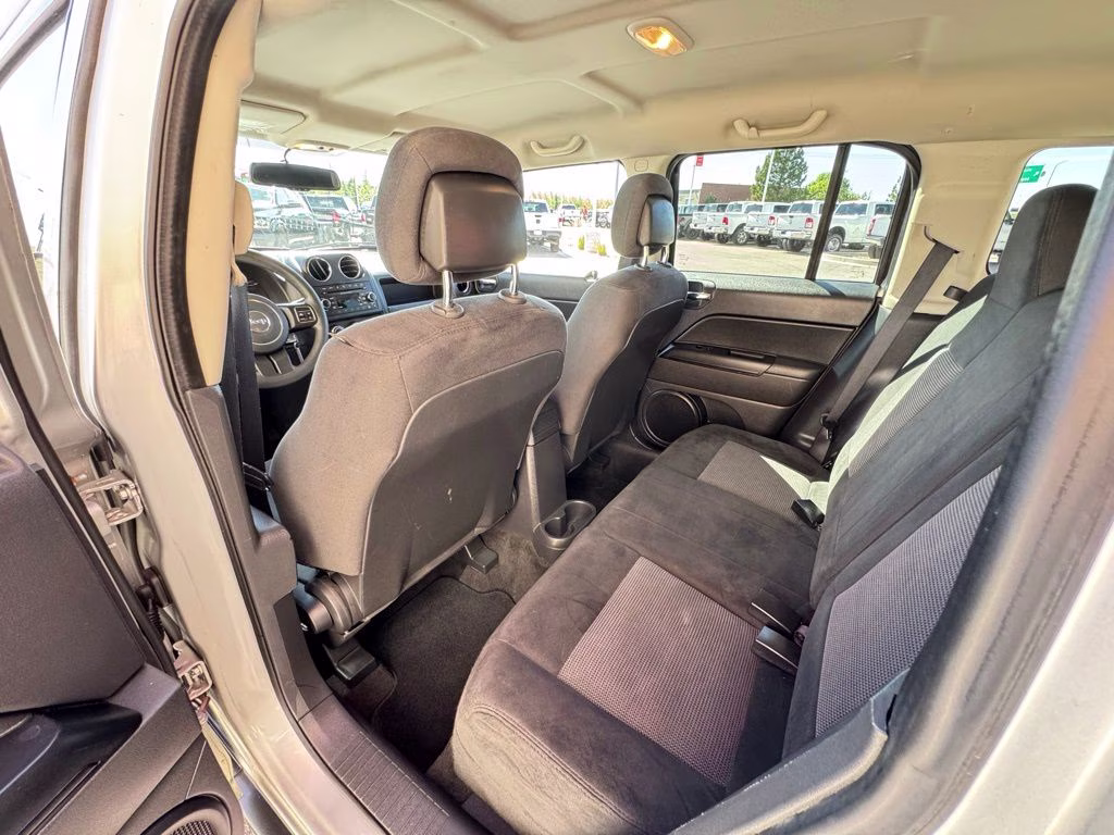 2014 Bright Silver Metallic Clearcoat Jeep Patriot Sport 4X4 SUV