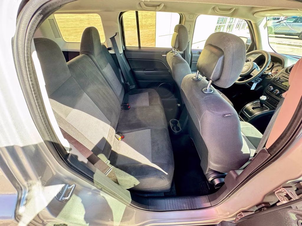 2014 Bright Silver Metallic Clearcoat Jeep Patriot Sport 4X4 SUV