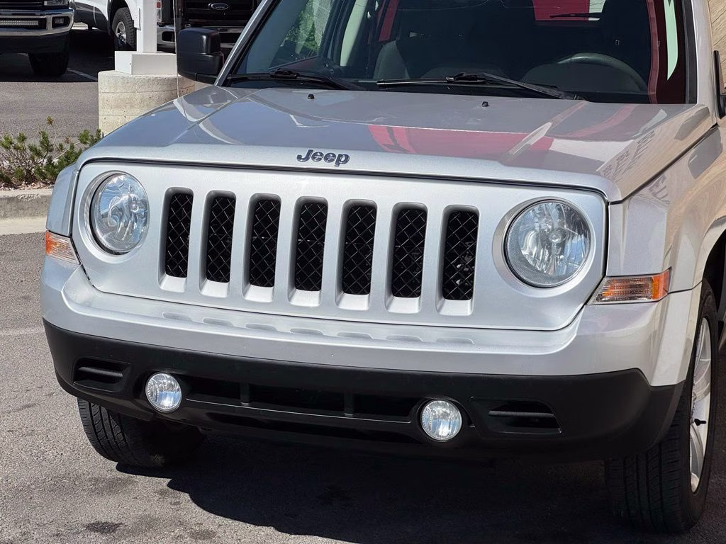 2014 Bright Silver Metallic Clearcoat Jeep Patriot Sport 4X4 SUV