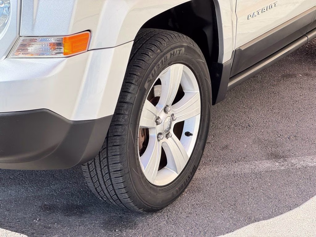 2014 Bright Silver Metallic Clearcoat Jeep Patriot Sport 4X4 SUV