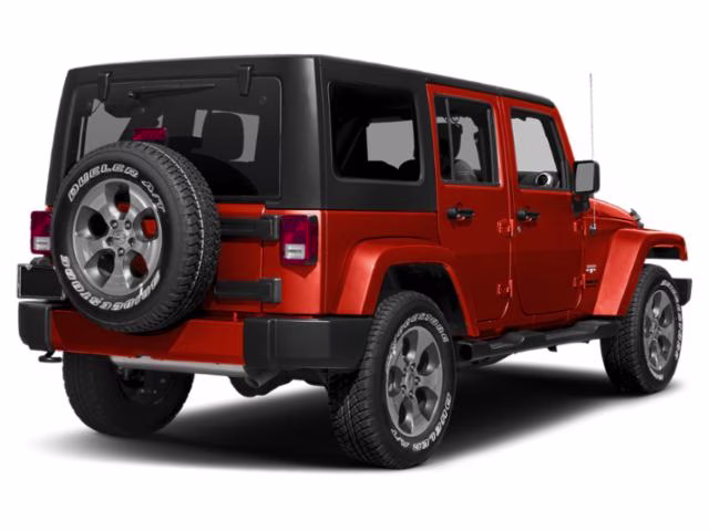2015 Sunset Orange Pearlcoat Jeep Wrangler Sahara 4X4 SUV