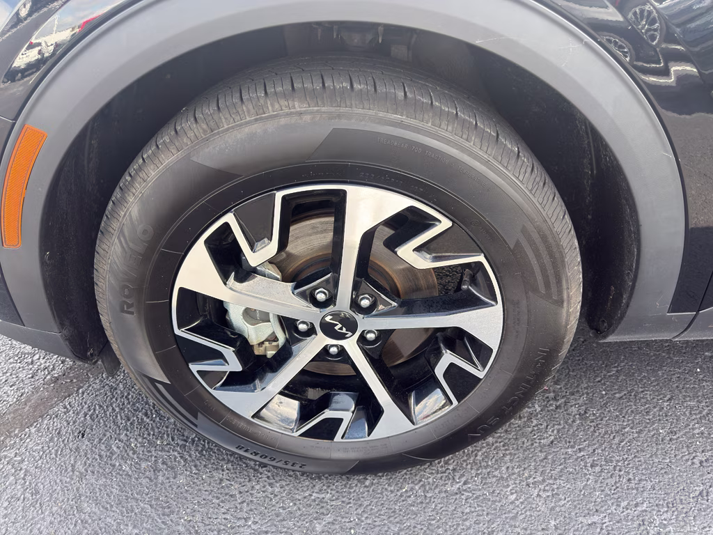 2024 Ebony Black Kia Sportage EX FWD SUV