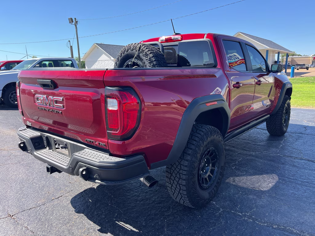 2024 Volcanic Red Tintcoat GMC Canyon 4WD AT4X 4X4 Truck
