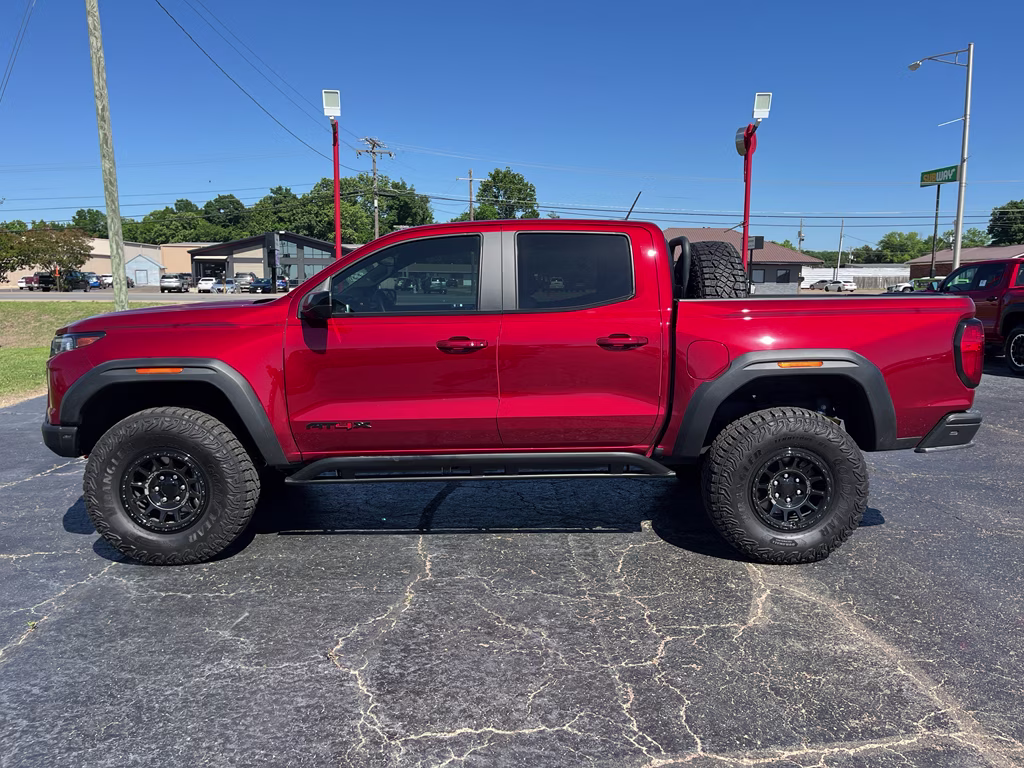 2024 Volcanic Red Tintcoat GMC Canyon 4WD AT4X 4X4 Truck