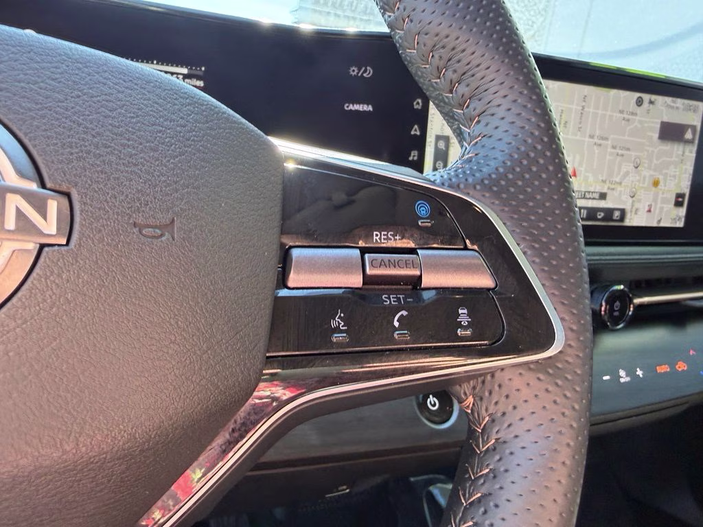 2023 Brilliant Silver Metallic/Black Diamond Pearl Nissan ARIYA ENGAGE+ e-4ORCE AWD SUV