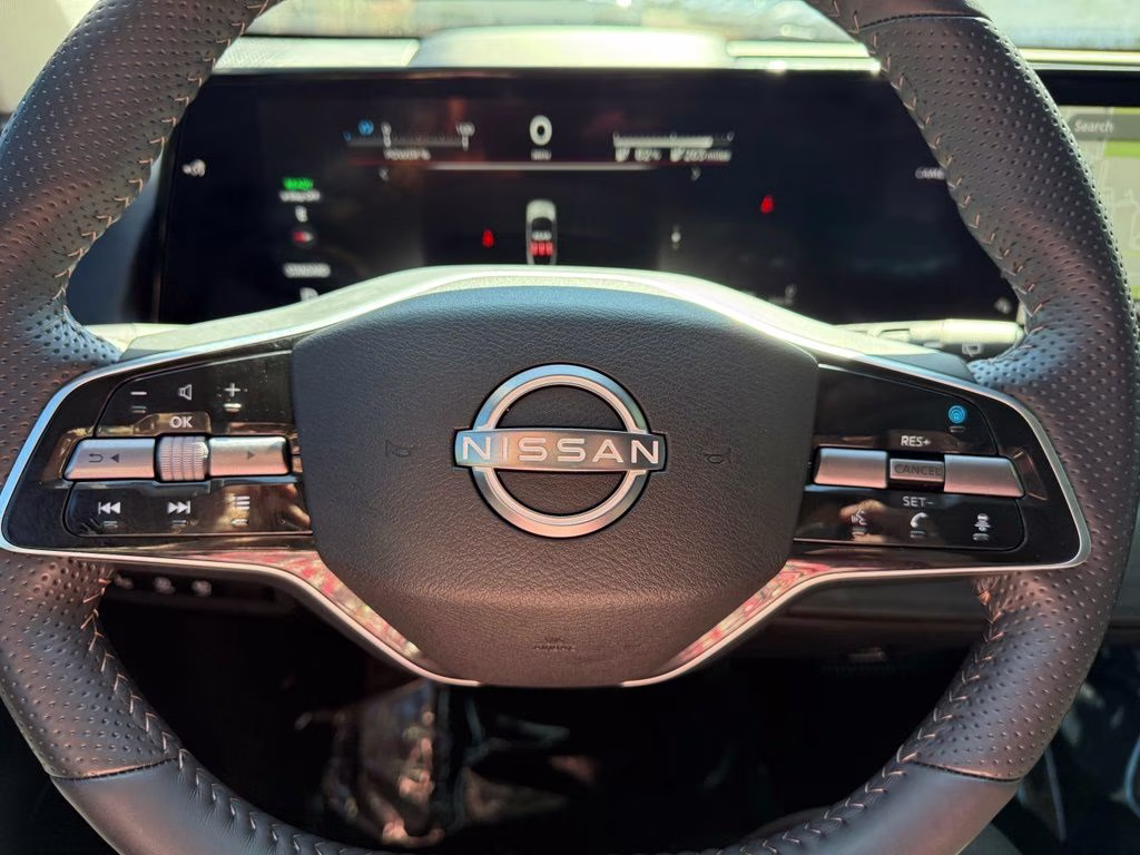 2023 Brilliant Silver Metallic/Black Diamond Pearl Nissan ARIYA ENGAGE+ e-4ORCE AWD SUV