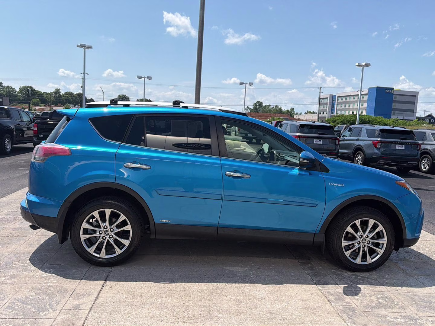 2016 Electric Storm Blue Toyota RAV4 Hybrid Limited AWD SUV