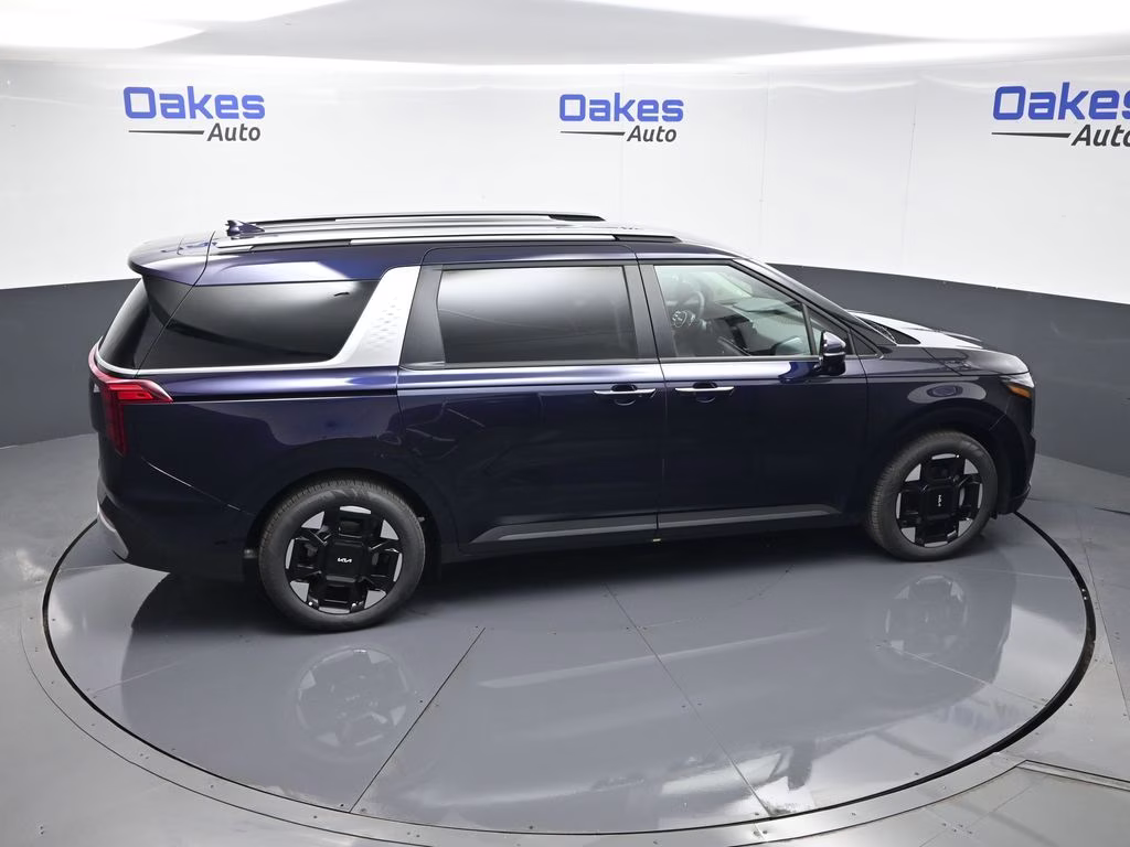 2026 Deep Chroma Blue Kia Carnival EX FWD Van