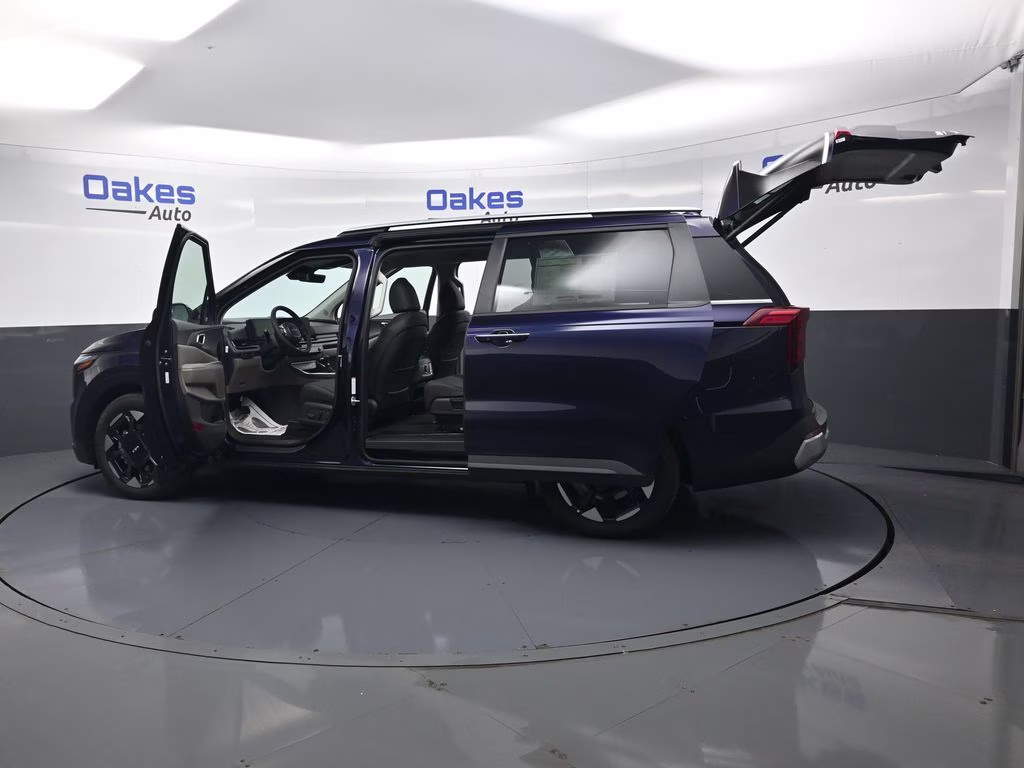 2026 Deep Chroma Blue Kia Carnival EX FWD Van