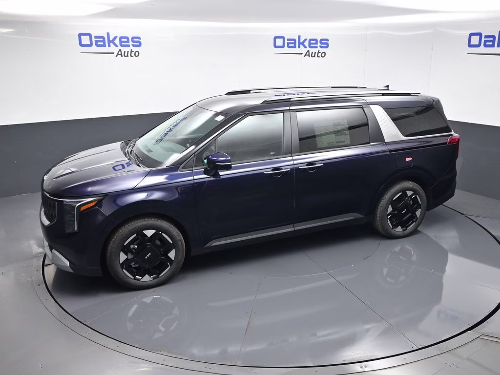 2026 Deep Chroma Blue Kia Carnival EX FWD Van