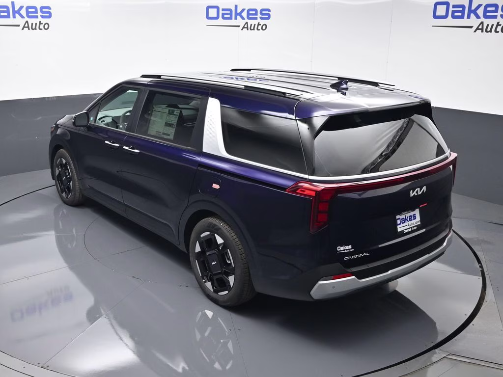 2026 Deep Chroma Blue Kia Carnival EX FWD Van