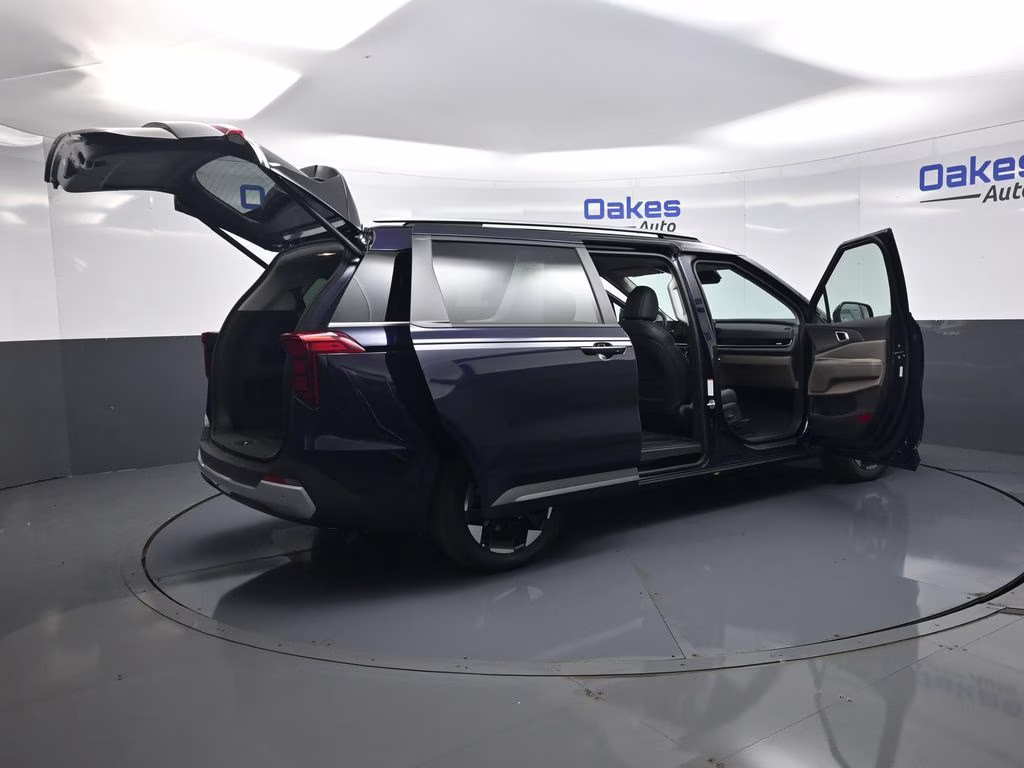 2026 Deep Chroma Blue Kia Carnival EX FWD Van