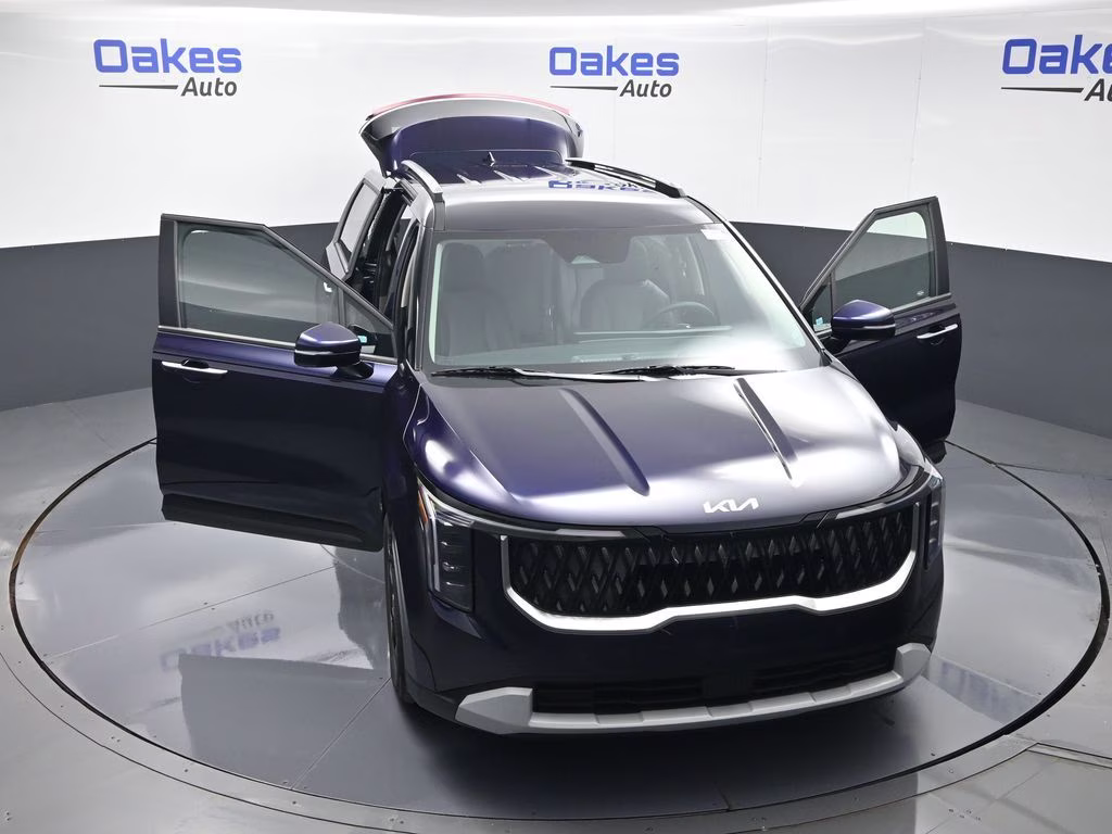 2026 Deep Chroma Blue Kia Carnival EX FWD Van