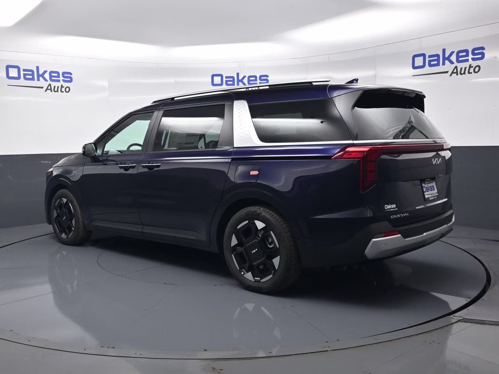 2026 Deep Chroma Blue Kia Carnival EX FWD Van