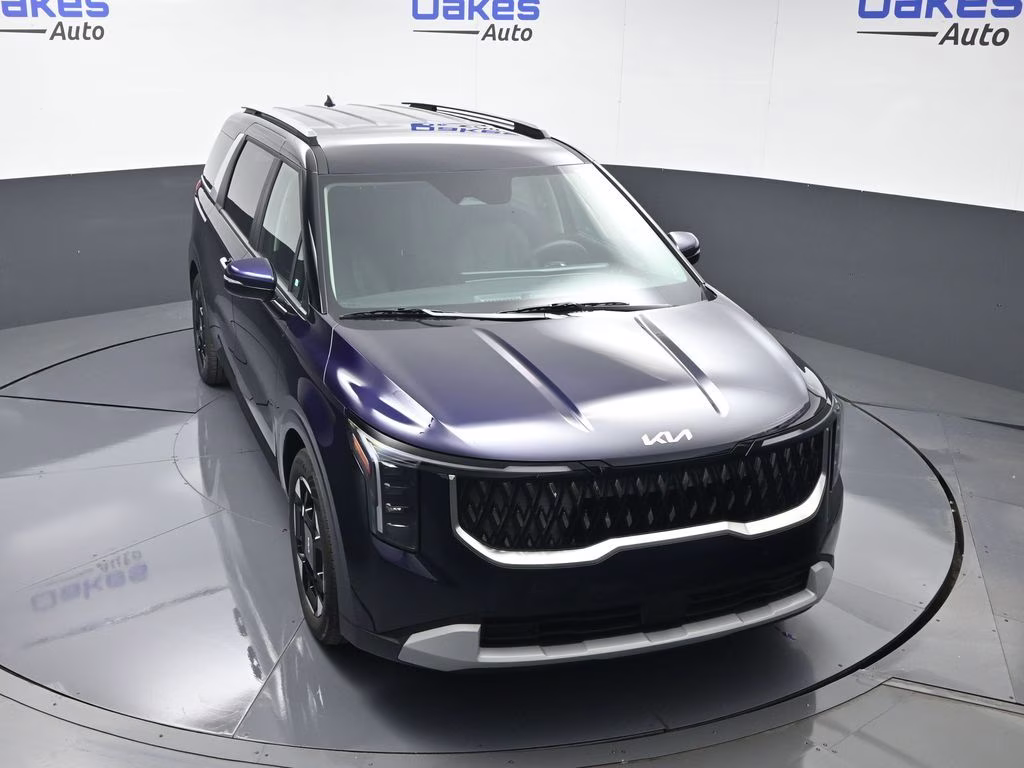 2026 Deep Chroma Blue Kia Carnival EX FWD Van