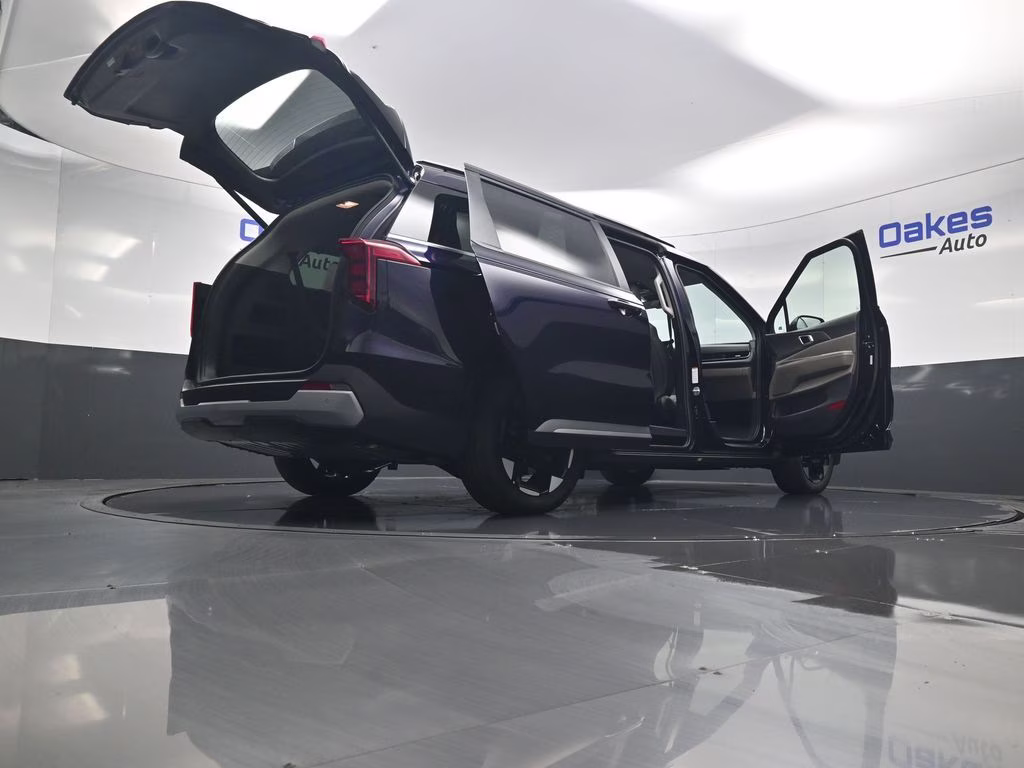 2026 Deep Chroma Blue Kia Carnival EX FWD Van