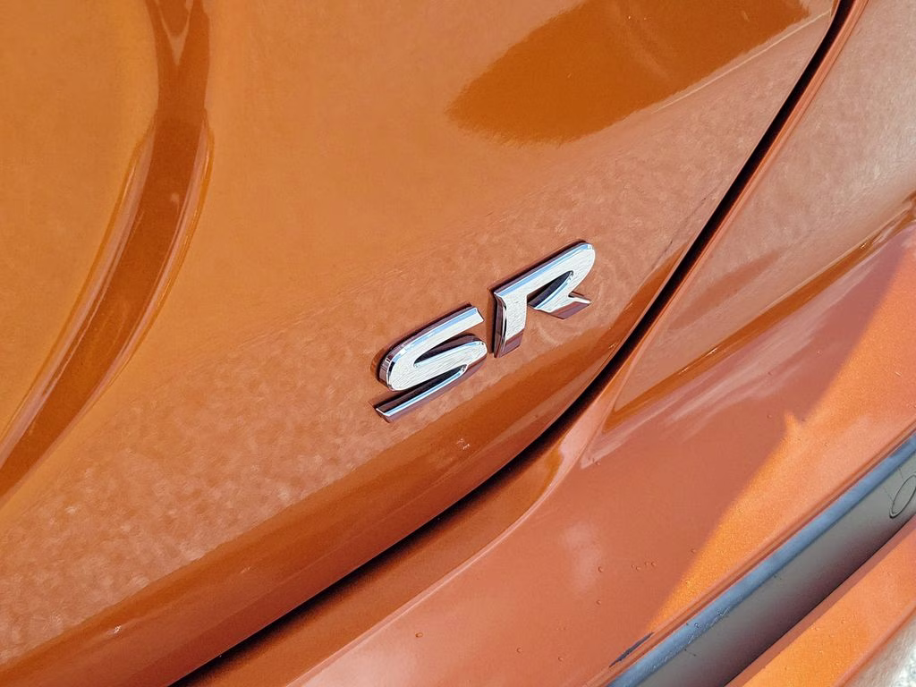2023 Monarch Orange Metallic/Super Black Nissan Kicks SR FWD SUV