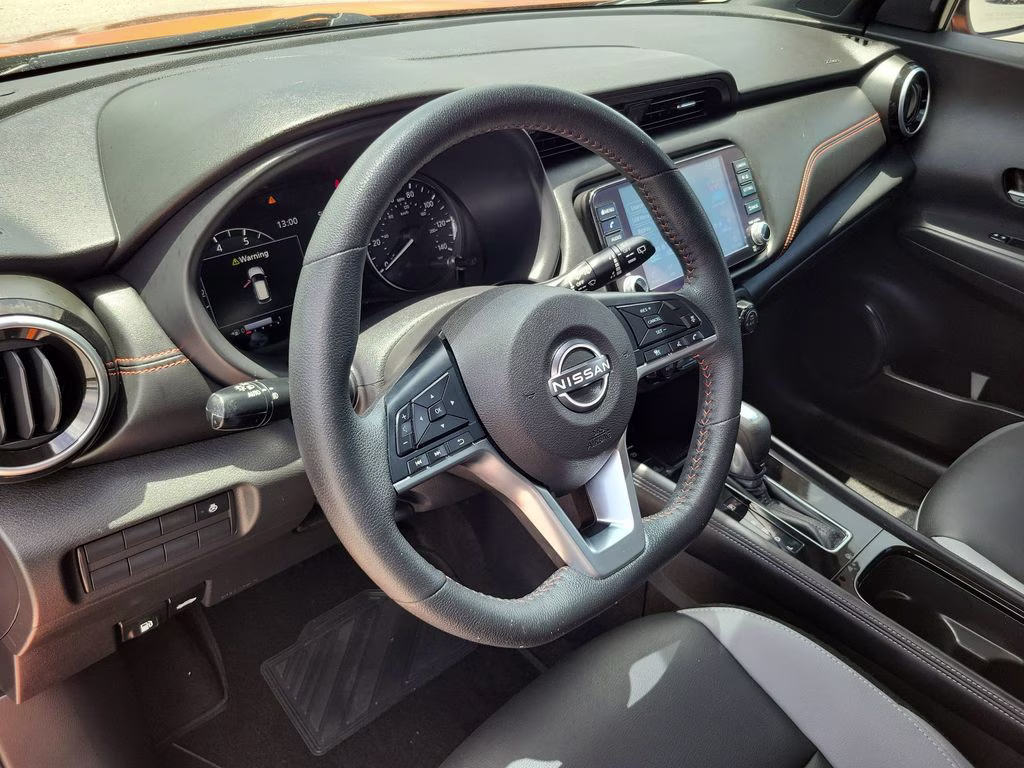 2023 Monarch Orange Metallic/Super Black Nissan Kicks SR FWD SUV