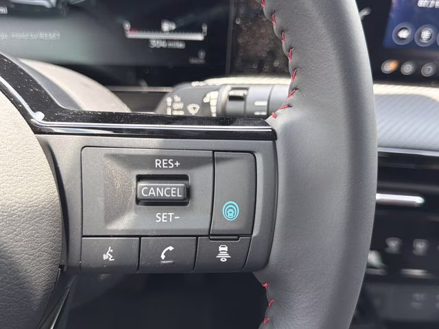 2026 Gun Metallic/Scarlet Ember Tintcoat Nissan Kicks SR AWD SUV