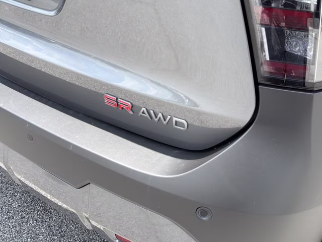 2026 Gun Metallic/Scarlet Ember Tintcoat Nissan Kicks SR AWD SUV