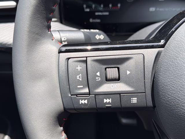 2026 Gun Metallic/Scarlet Ember Tintcoat Nissan Kicks SR AWD SUV